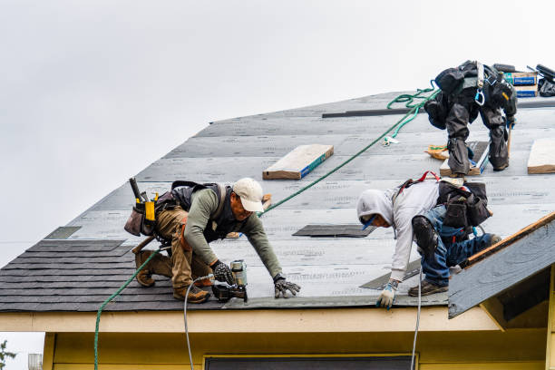Professional Gutter Installation technician working in Talmage, KS